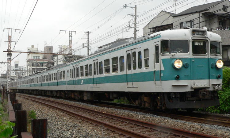 地上時代の南田辺駅付近を行く113系F409編成+カフェオレ編成