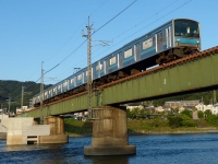 2021年2月撮影、JR奈良線宇治川鉄橋にて。205系NE407編成（1003）です。