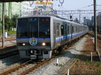 2003年7月撮影、新大阪駅にて。USJのヘッドマークを掲出しています。