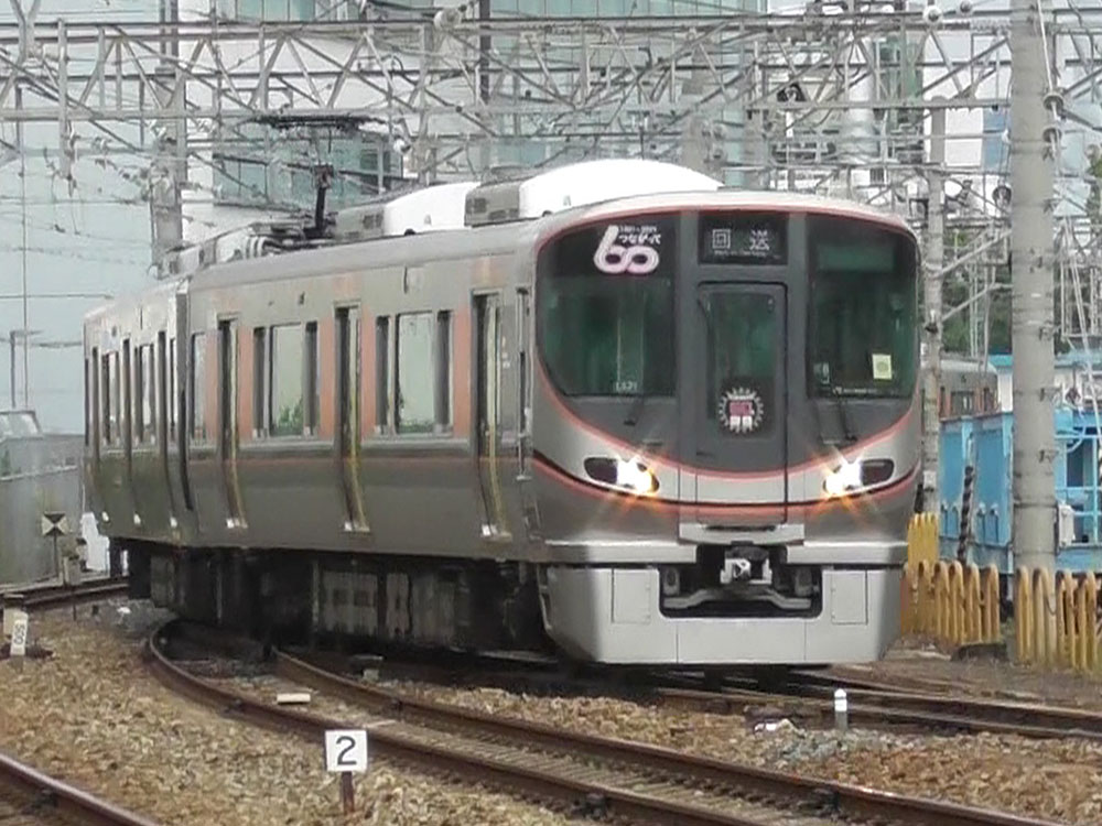 安治川口駅の貨物エリアに入ろうとする323系LS21編成保安列車