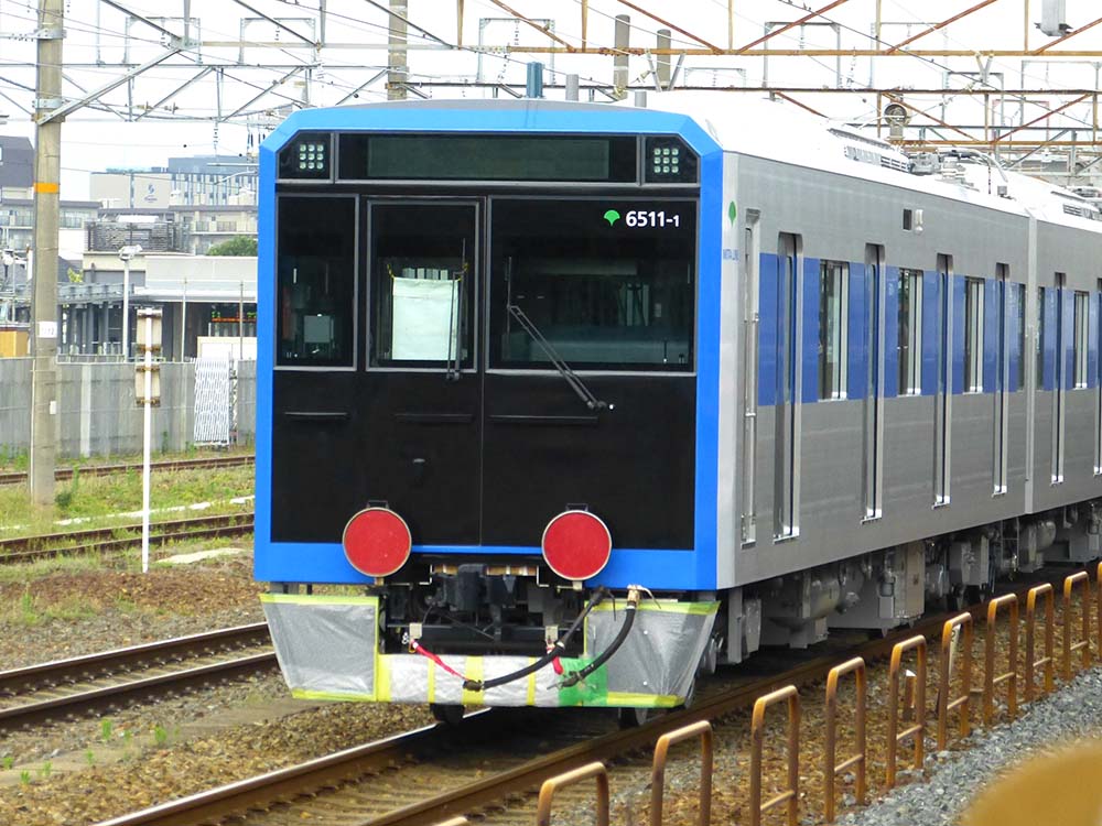 甲種輸送される都営三田線用新型車両6500形第11編成